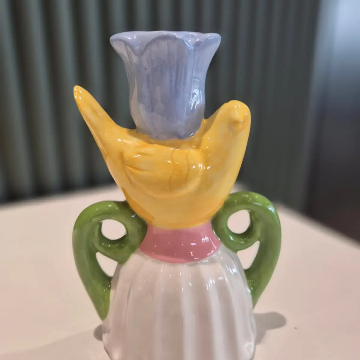 Bougeoir oiseau jaune